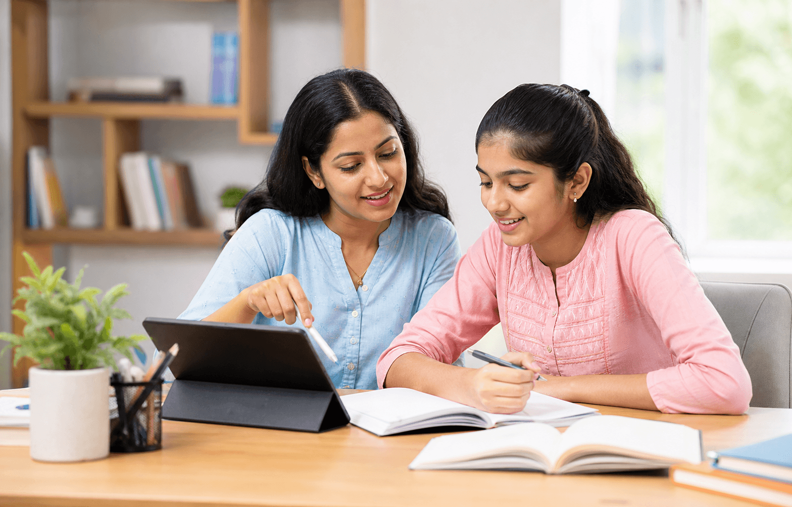 Tutor helping a student during a scheduled lesson